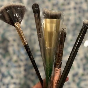 Sample makeup brushes, various brands and types.